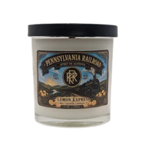Candle with Pennsylvania Railroad label on a white background