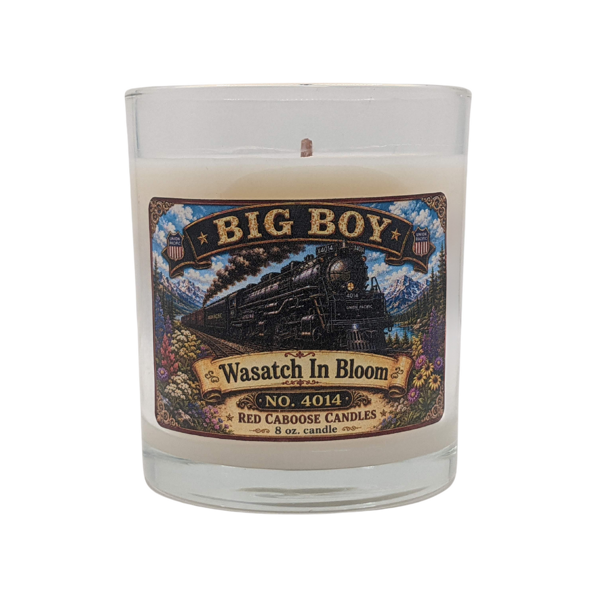 Candle with a decorative label featuring a Big Boy 4014 design on a white background. Scent is floral, fresh, earthy