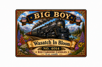 Decorative candle packaging with a train design and 'Big Boy' text.
