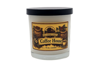An 8 oz glass jar candle with a black lid and a vintage-style 'Coffee House' label by Red Caboose Candles, shown on a white background.