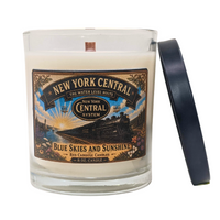 Candle with New York Central Railroad label, Blue Skies & Sunshine, vintage Hudson steam locomotive.  With black lid.  Scent is fresh, fruity, floral, earthy