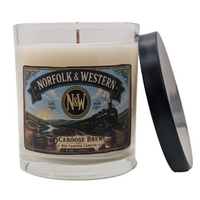 Candle with lid of Norfolk & Western with vintage locomotive on label.  Scents are coffee, buttery pastry, cream